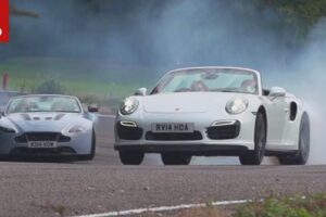 Porsche 911 Turbo S vs Aston Martin V12 ในการทดสอบของ Autocar